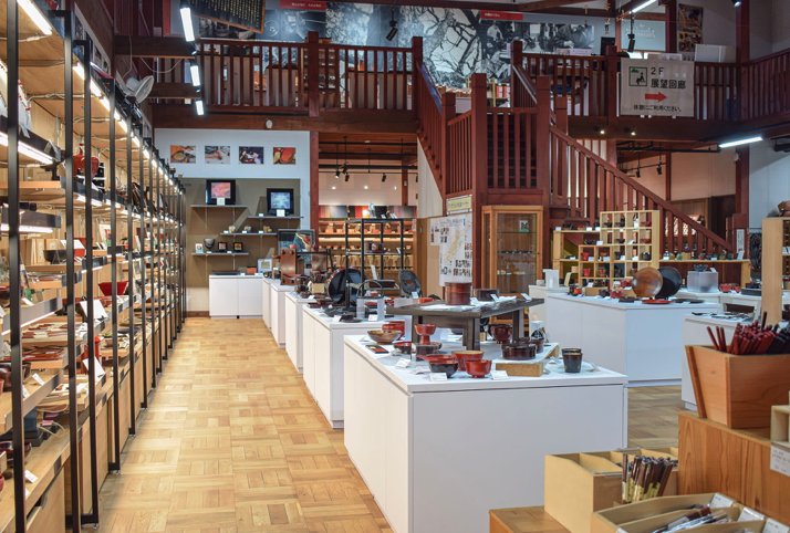 Rows of lacquerware on display inside the Kiso Traditional Crafts Center