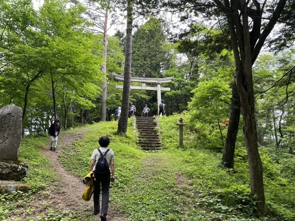 A wooden torii gate near the summit of Torii Pass
