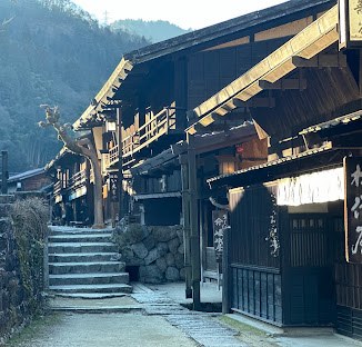 A quiet street of wooden buildings in Tsumago-juku